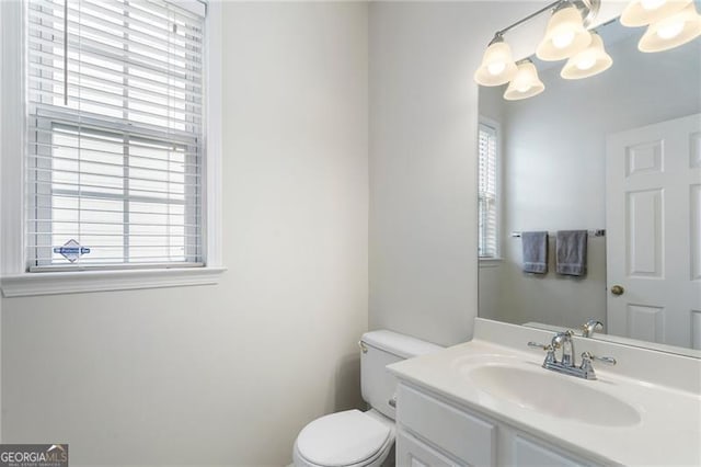 4321 Sugar Maple Chase NW, Acworth, GA 30101 - bathroom featuring healthy amount of natural light, toilet, vanity, and a chandelier