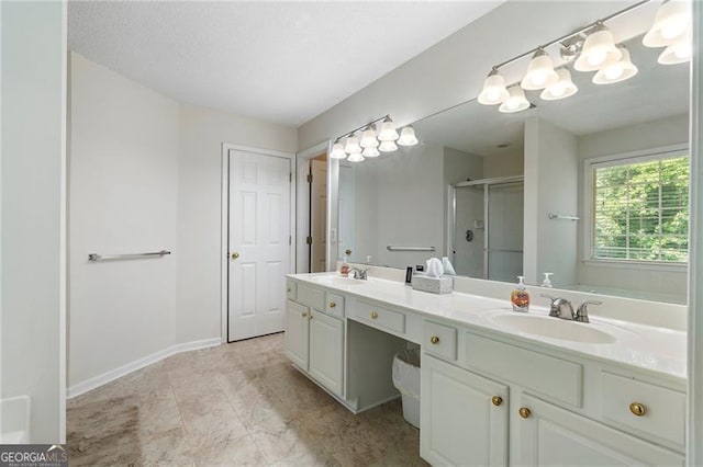 4321 Sugar Maple Chase NW, Acworth, GA 30101 - bathroom featuring double vanity, a shower stall, and baseboards