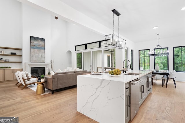 2595 Grassview Dr, Milton, GA 30004 - kitchen with a sink, stainless steel dishwasher, a chandelier, light wood-type flooring, and recessed lighting