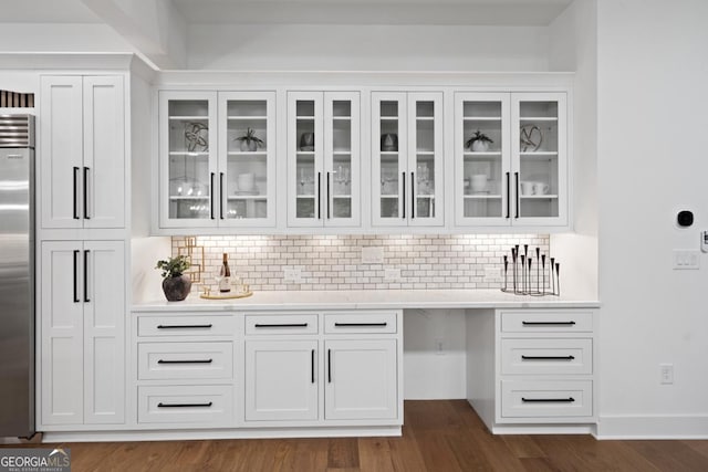 2595 Grassview Dr, Milton, GA 30004 - bar with decorative backsplash, stainless steel built in fridge, and dark wood finished floors