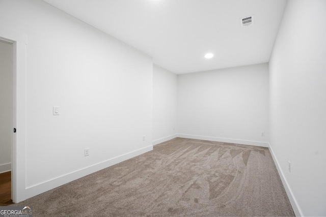 2595 Grassview Dr, Milton, GA 30004 - carpeted spare room featuring baseboards and recessed lighting