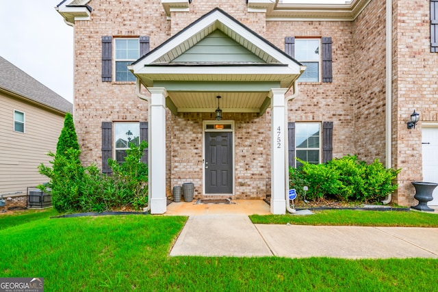 4752 Albany Way S, Fulton, GA 30331 - doorway to property featuring brick siding and a yard