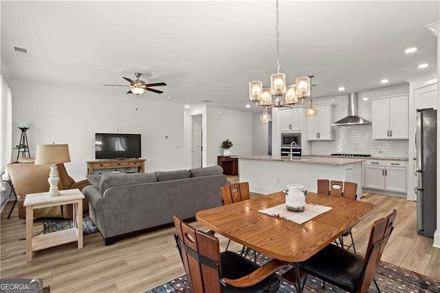 5121 Aster Bnd, Canton, GA 30114 - dining space with a ceiling fan, light wood-style floors, a chandelier, and recessed lighting