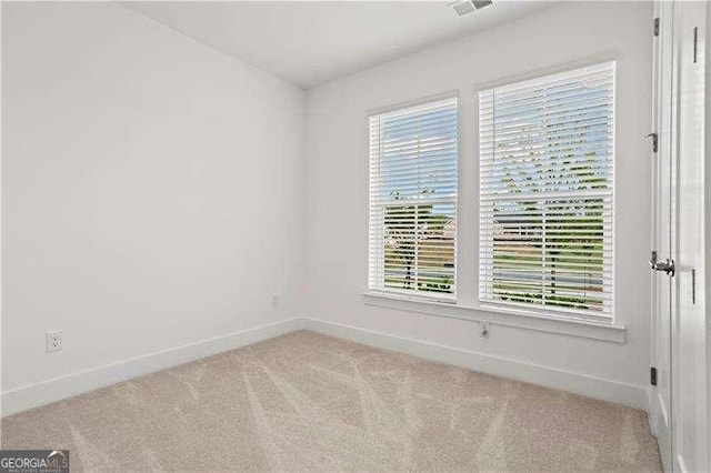 5121 Aster Bnd, Canton, GA 30114 - carpeted spare room featuring baseboards
