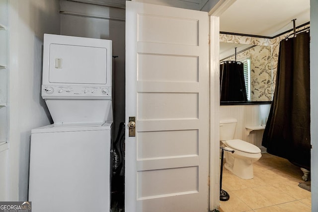 120 Newton St, Pooler, GA 31322 - laundry room with estacked washer and dryer and tile patterned floors