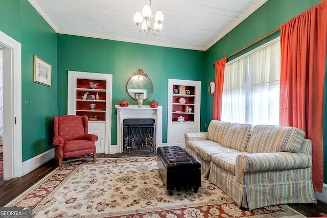 120 Newton St, Pooler, GA 31322 - living room featuring crown molding, a fireplace, a chandelier, wood finished floors, and baseboards