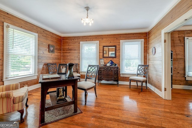 120 Newton St, Pooler, GA 31322 - office area with a chandelier, baseboards, wood finished floors, and wood walls