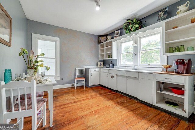 120 Newton St, Pooler, GA 31322 - kitchen with open shelves, light wood-style flooring, light countertops, and baseboards