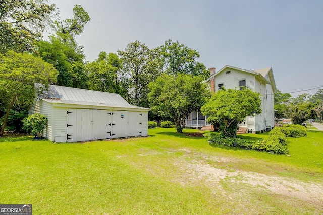 120 Newton St, Pooler, GA 31322 - view of grassy yard with an outbuilding