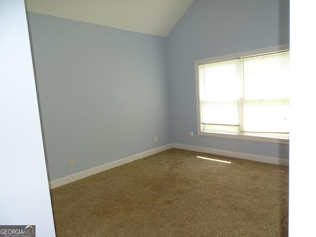 228 Laurel Landing Blvd, Kingsland, GA 31548 - carpeted empty room with vaulted ceiling and baseboards