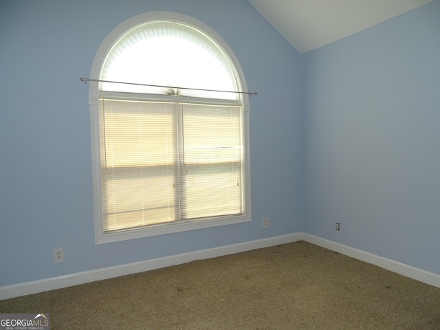 228 Laurel Landing Blvd, Kingsland, GA 31548 - empty room with carpet flooring, vaulted ceiling, and baseboards
