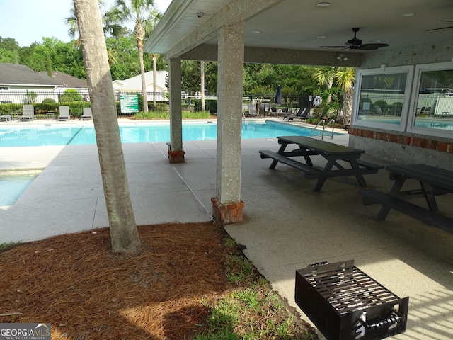 228 Laurel Landing Blvd, Kingsland, GA 31548 - community pool featuring a ceiling fan and a patio