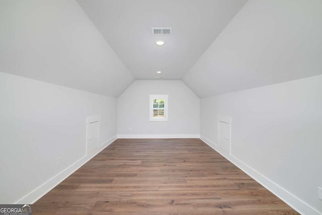 8370 Pleasant Grove Cir, Gainesville, GA 30506 - additional living space with vaulted ceiling, wood finished floors, and recessed lighting