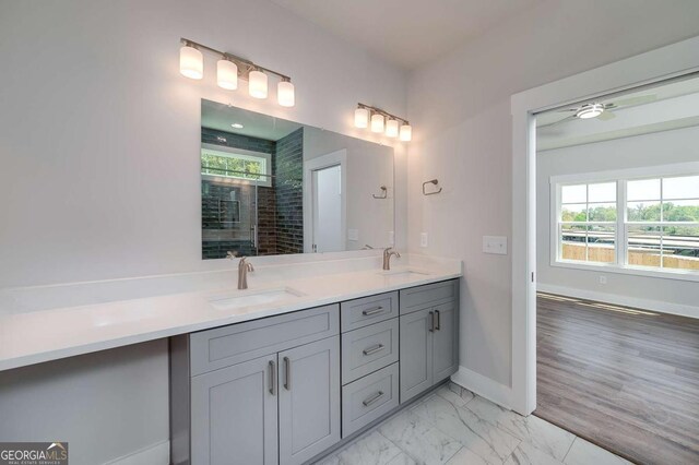 8370 Pleasant Grove Cir, Gainesville, GA 30506 - full bathroom with double vanity, tiled shower, and marble finish flooring