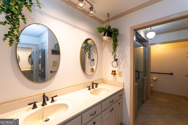 1701 City Blvd, Waycross, GA 31501 - bathroom featuring crown molding, double vanity, toilet, and tile patterned flooring