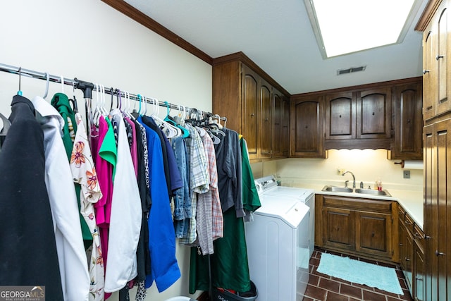 1701 City Blvd, Waycross, GA 31501 - laundry area featuring washer and dryer and cabinet space