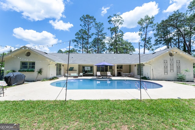 1701 City Blvd, Waycross, GA 31501 - swimming pool with area for grilling and a patio