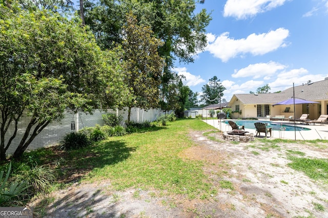 1701 City Blvd, Waycross, GA 31501 - view of yard with an outdoor fire pit and a patio area