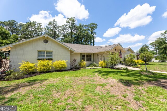 1701 City Blvd, Waycross, GA 31501 - single story home featuring a front lawn and brick siding