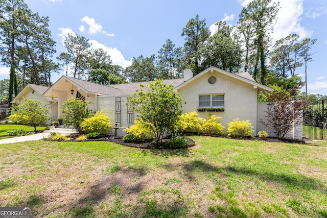 1701 City Blvd, Waycross, GA 31501 - view of front of property with brick siding and a chimney