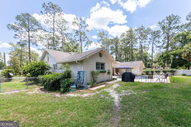 1701 City Blvd, Waycross, GA 31501 - rear view of property with a patio area and brick siding