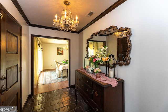 1701 City Blvd, Waycross, GA 31501 - hall with a chandelier, crown molding, baseboards, and a textured ceiling