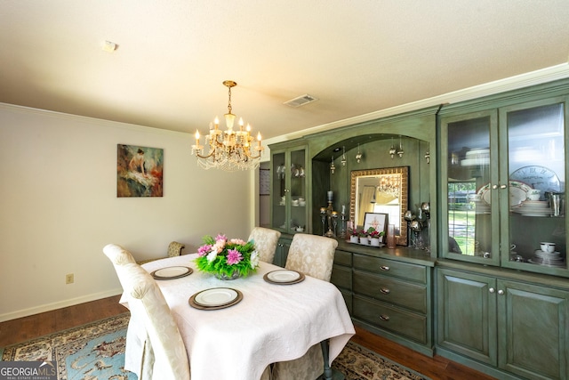 1701 City Blvd, Waycross, GA 31501 - dining space with a chandelier, baseboards, dark wood finished floors, and ornamental molding