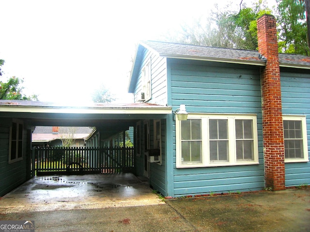 view of home's exterior with a chimney