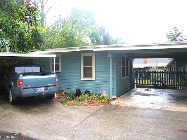 view of home's exterior with driveway