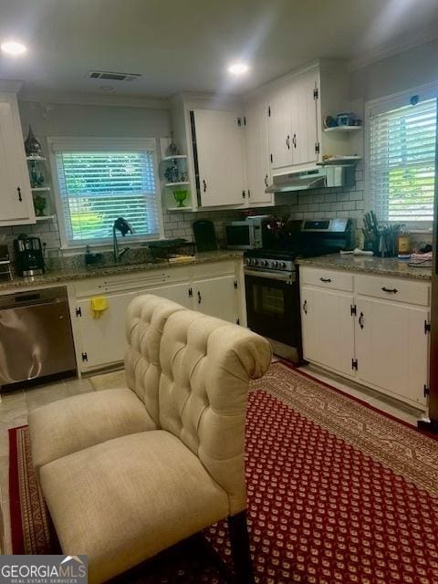 3629 Centerview Dr, Marietta, GA 30066 - kitchen featuring open shelves, stainless steel appliances, decorative backsplash, a sink, and white cabinets