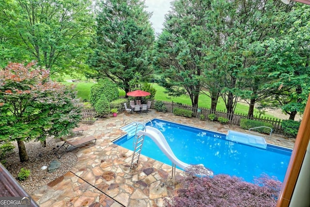 2877 Cynth Creek Rd, Hiawassee, GA 30546 - view of pool featuring a patio area, a water slide, and a fenced backyard