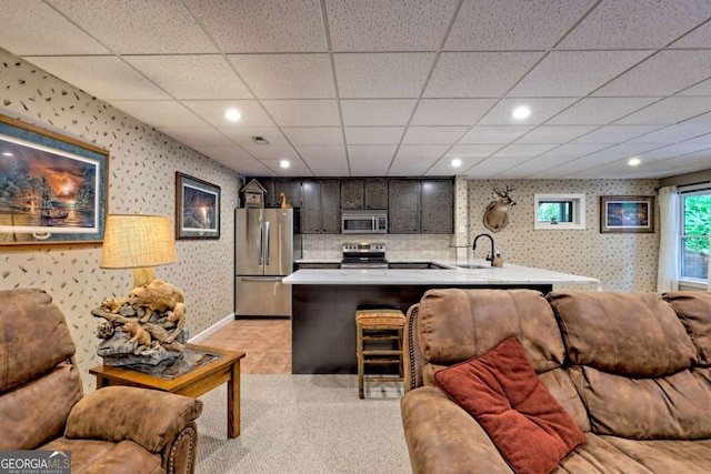 2877 Cynth Creek Rd, Hiawassee, GA 30546 - living area featuring wallpapered walls, baseboards, a drop ceiling, and recessed lighting