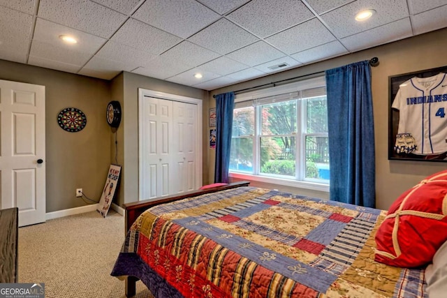2877 Cynth Creek Rd, Hiawassee, GA 30546 - bedroom with carpet floors, baseboards, a paneled ceiling, and a closet