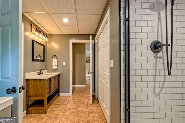 2877 Cynth Creek Rd, Hiawassee, GA 30546 - bathroom with recessed lighting, vanity, tiled shower, tile patterned flooring, and a paneled ceiling