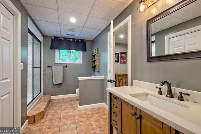 2877 Cynth Creek Rd, Hiawassee, GA 30546 - full bath with toilet, a drop ceiling, a shower, vanity, and tile patterned flooring