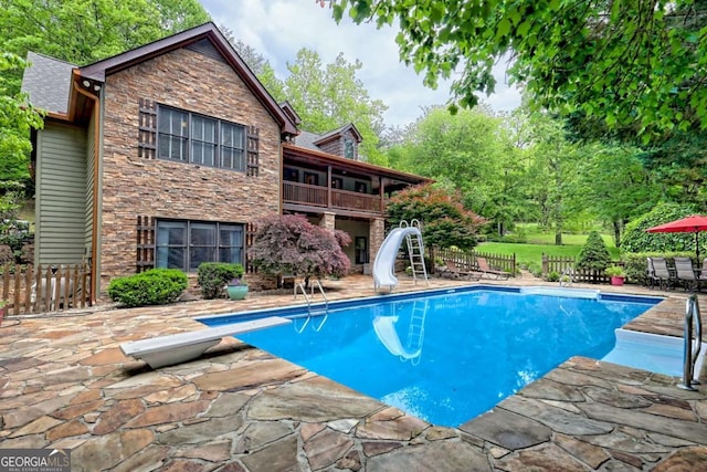2877 Cynth Creek Rd, Hiawassee, GA 30546 - view of swimming pool with a water slide, a patio, and a diving board