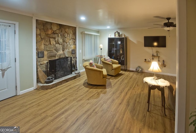 407 Hillside Dr, Clayton, GA 30525 - living area featuring wood finished floors, a stone fireplace, ceiling fan, baseboards, and recessed lighting
