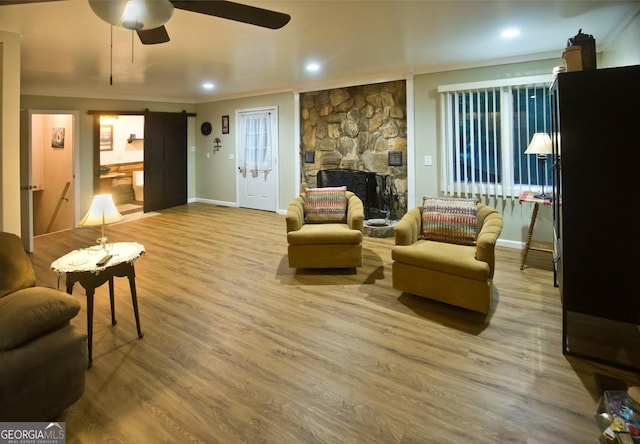 407 Hillside Dr, Clayton, GA 30525 - living area with ceiling fan, baseboards, ornamental molding, wood finished floors, and recessed lighting