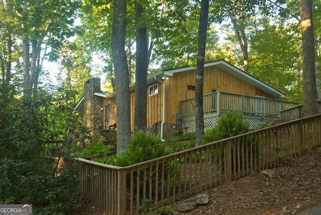 407 Hillside Dr, Clayton, GA 30525 - view of side of property featuring a chimney