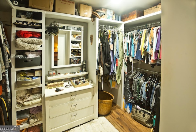 407 Hillside Dr, Clayton, GA 30525 - walk in closet featuring wood finished floors