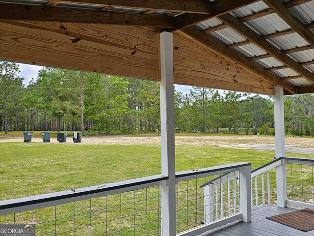 536 Gov Seay Rd, Collins, GA 30421 - deck featuring a yard and view of scattered trees