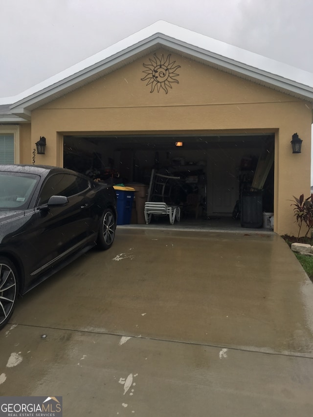 garage with driveway