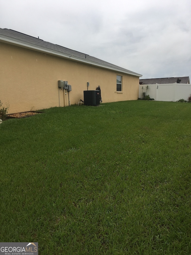 view of yard featuring cooling unit