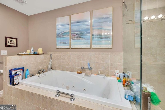 503 Marsh Cir, Saint Simons, GA 31522 - bathroom with a tub with jets