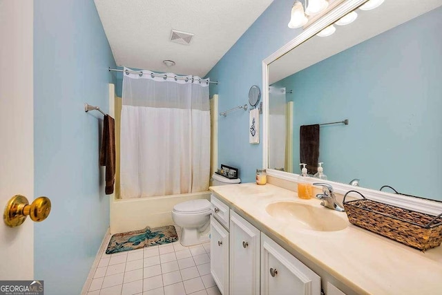 503 Marsh Cir, Saint Simons, GA 31522 - bathroom with tile patterned flooring, toilet, vanity, and shower / bathtub combination with curtain