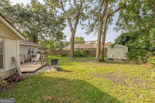 503 Marsh Cir, Saint Simons, GA 31522 - view of yard with a deck