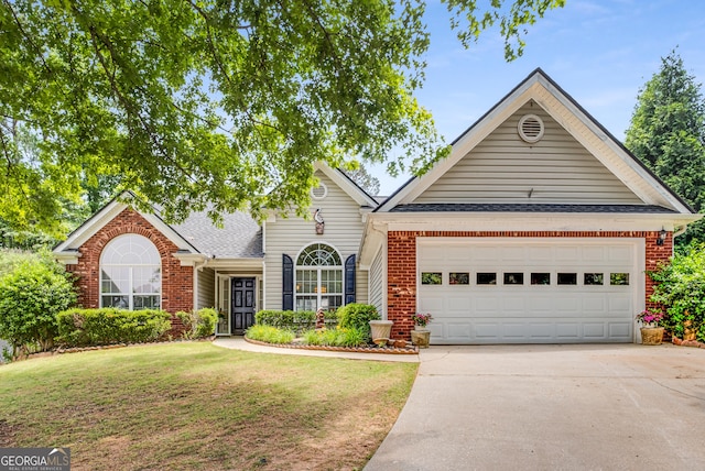 14 Winter Ln, Newnan, GA 30265 - traditional-style house featuring brick siding, concrete driveway, a garage, a front yard, and a shingled roof