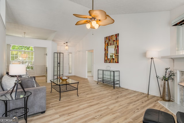 14 Winter Ln, Newnan, GA 30265 - living area with light wood-style floors, lofted ceiling, a ceiling fan, and baseboards