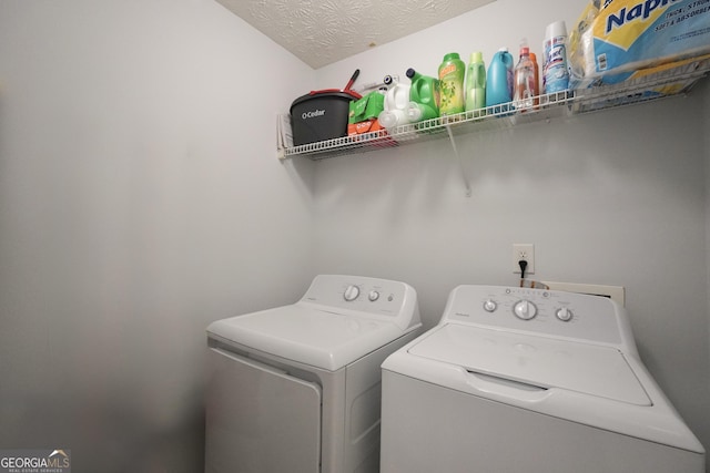 laundry area featuring washing machine and dryer