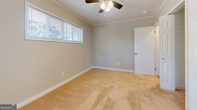 2280 Raleigh Dr, Augusta, GA 30904 - unfurnished bedroom featuring carpet flooring, crown molding, baseboards, and a ceiling fan